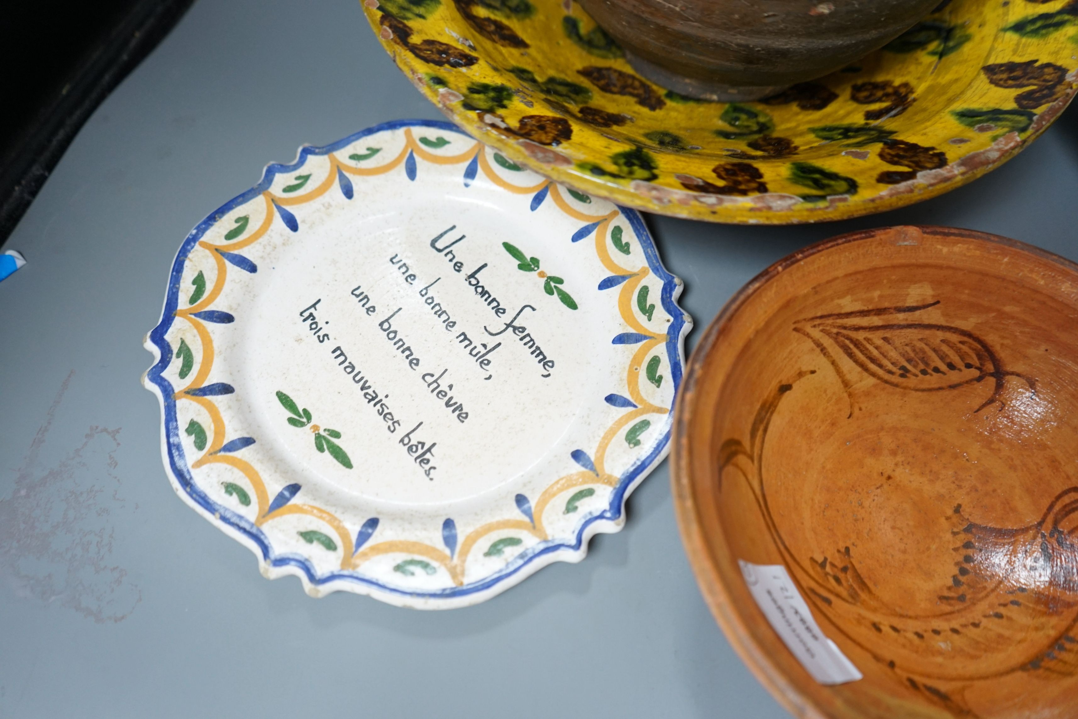 A group of 19th/20th century Continental pottery items to include two sponge ware dishes and a partially glazed jar, largest 20cm, (6)